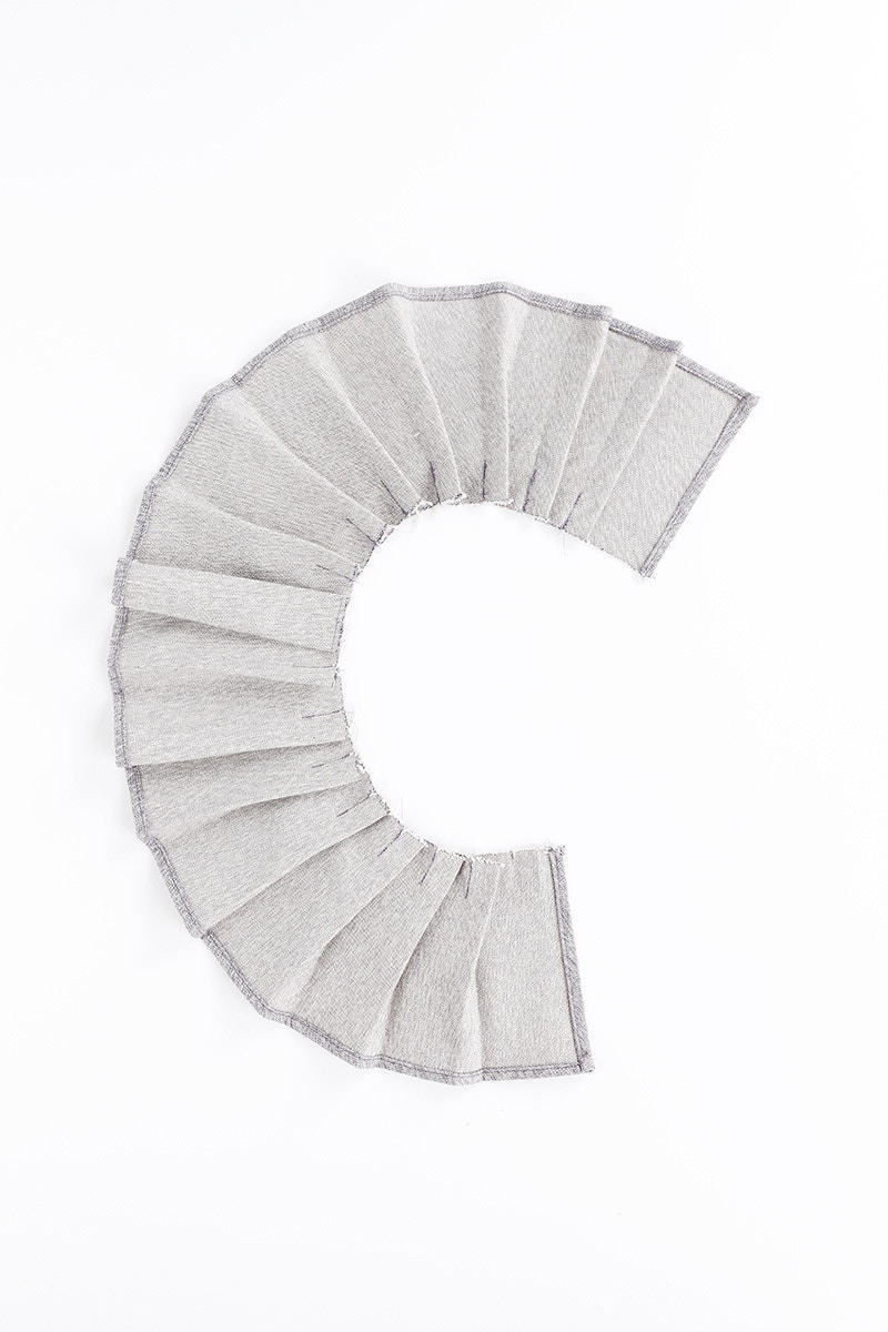 5 Collar is now pleated