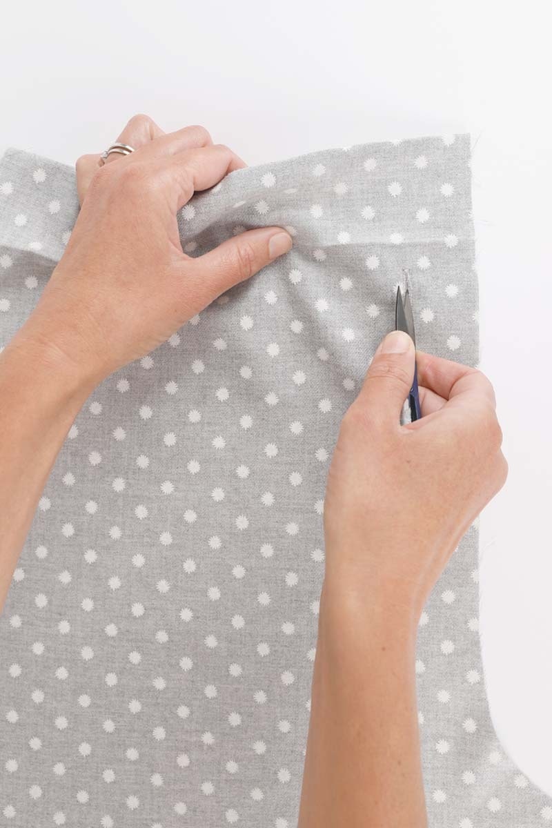 4 cutting button holes 2 hands
