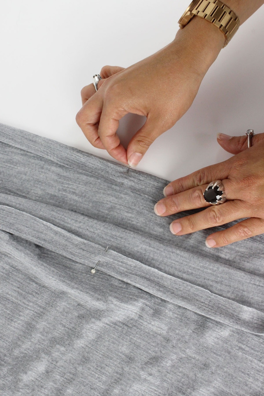 Elbe textiles sage merino tee shirt pinning hem fabric by the fabric store