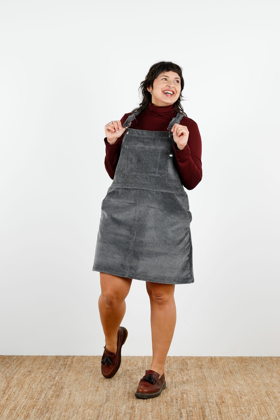 Margo Pinafore Zosia Front Holding Pinafore Smiling