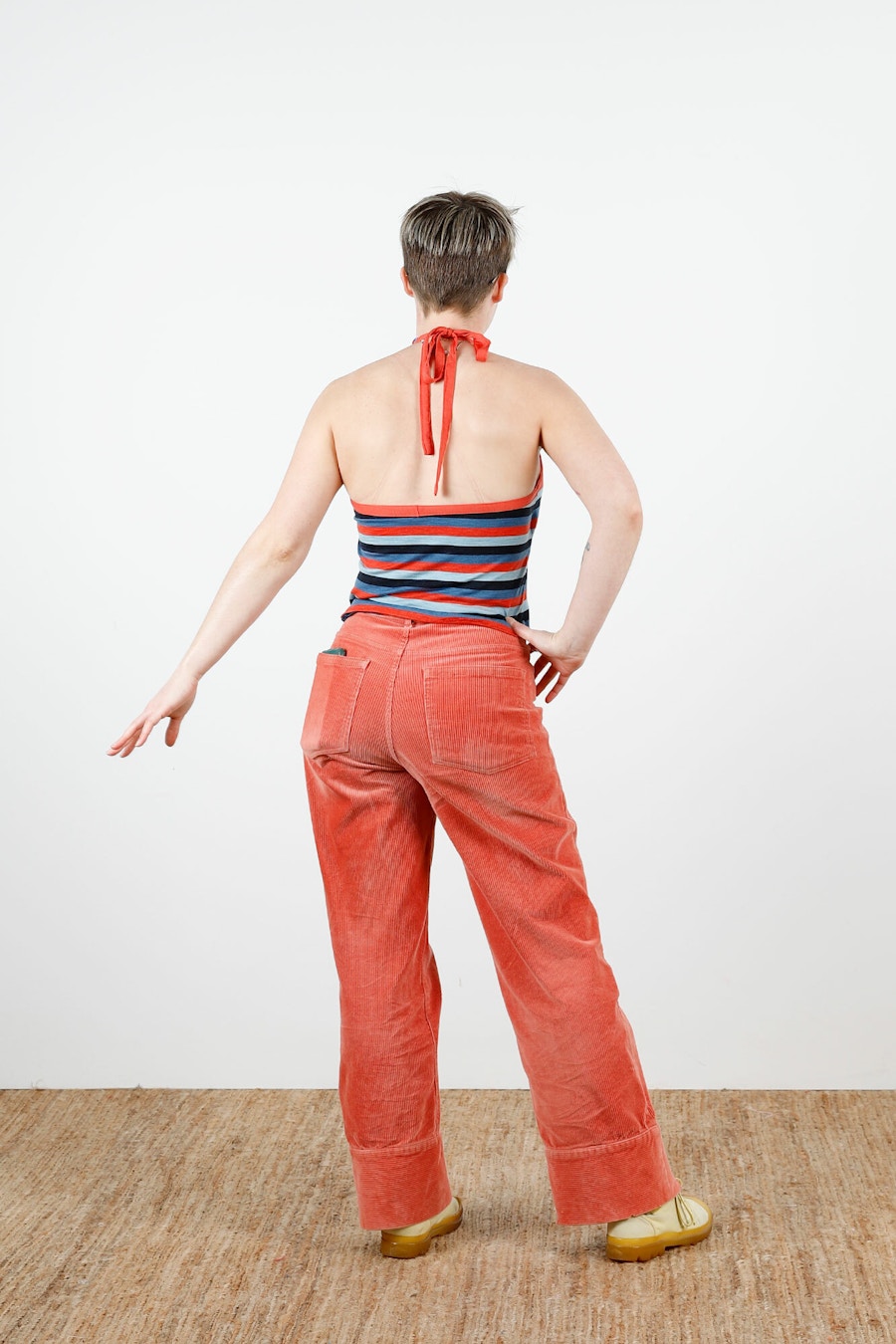 Bianca Merino Halter Back Hand Out