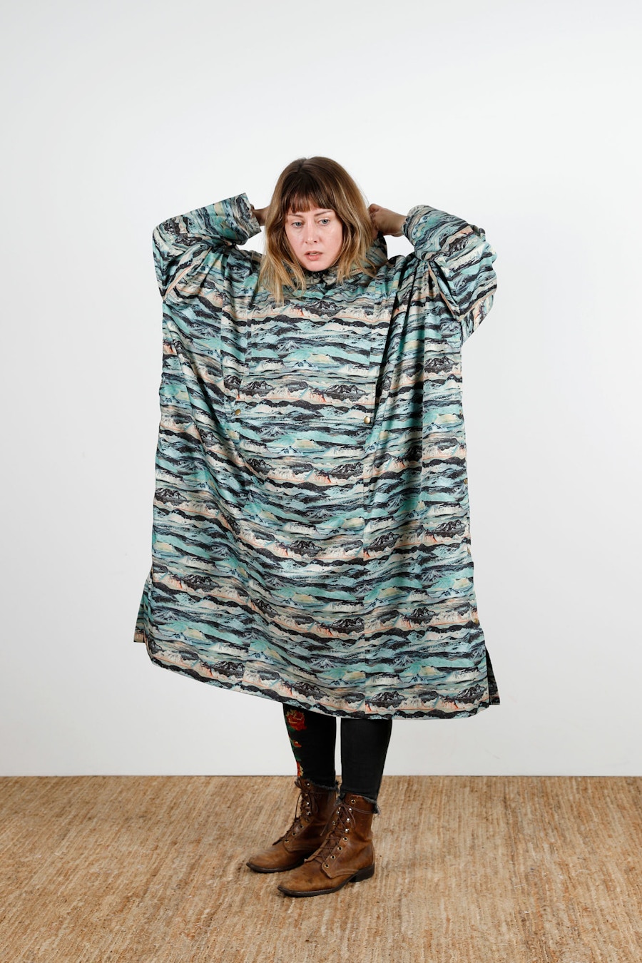 Becca Assembly Line Hoodie Poncho Liberty Front Square