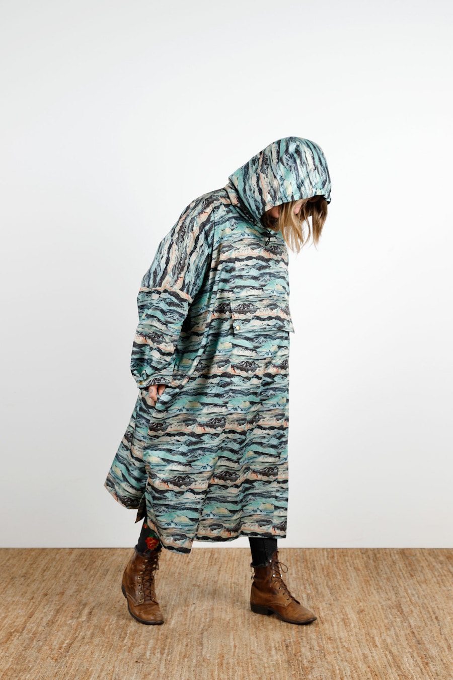 Becca Assembly Line Hoodie Poncho Liberty Hood Up Looking Down