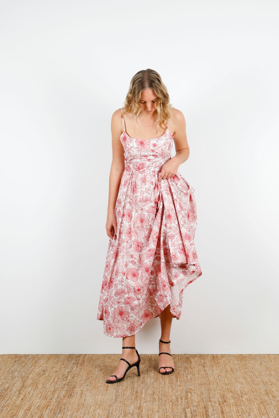 Beth Fit Flare Dress Front Looking Down Holding Dress