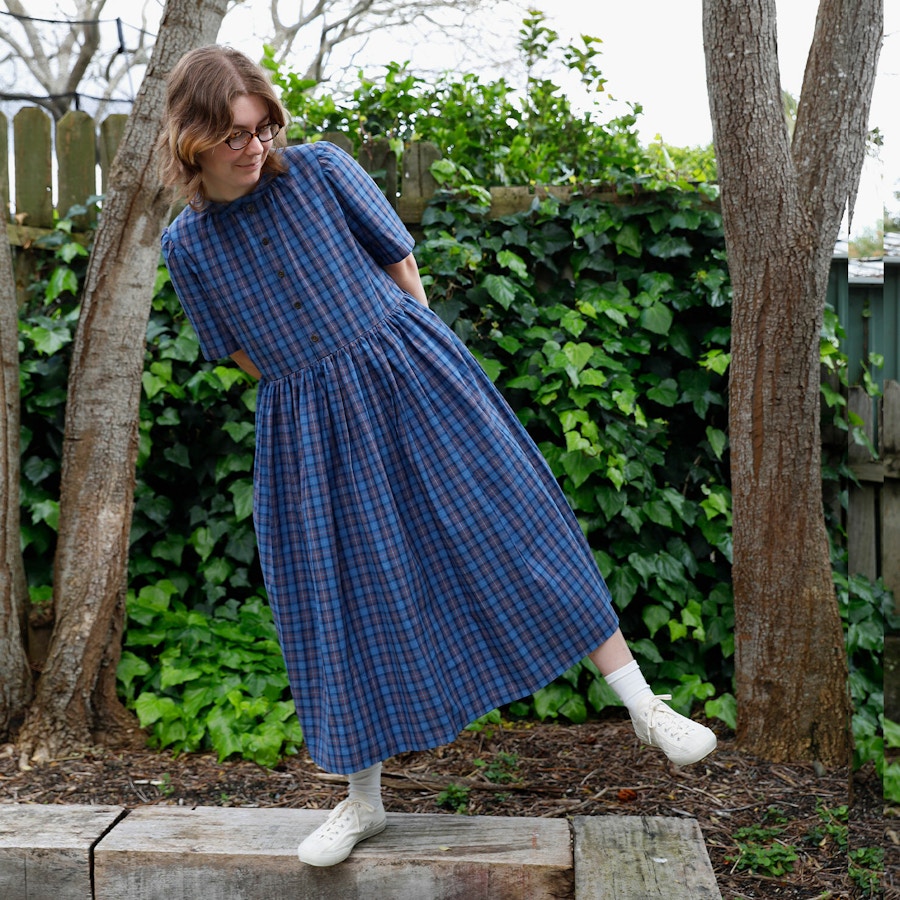 SQ Steph Orchards Dress Outside Front One Leg